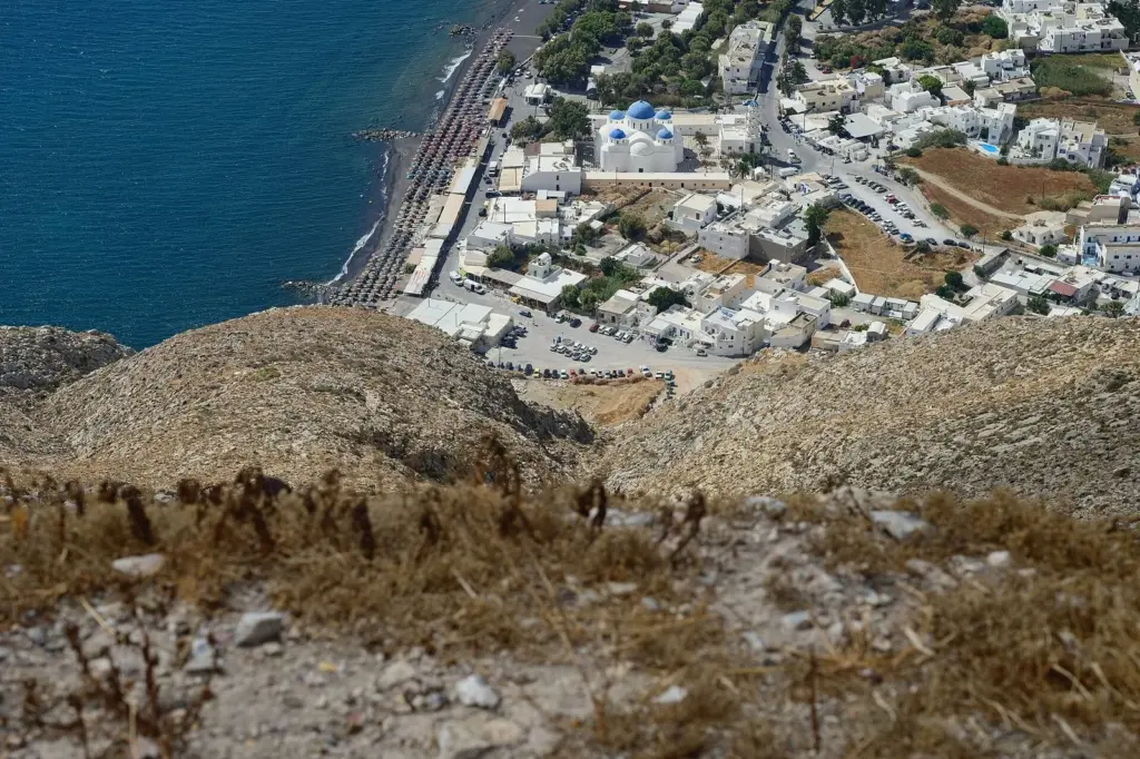 Perissa's long black-sand beach and village seen from the slopes of Mesa Vouno
