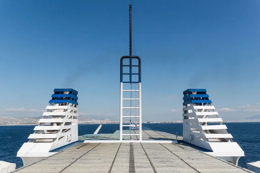Piraeus harbor and the Athens coastline seen from the bow of a departing ferry